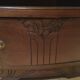 Solid oak bedside table with brown and white marble.