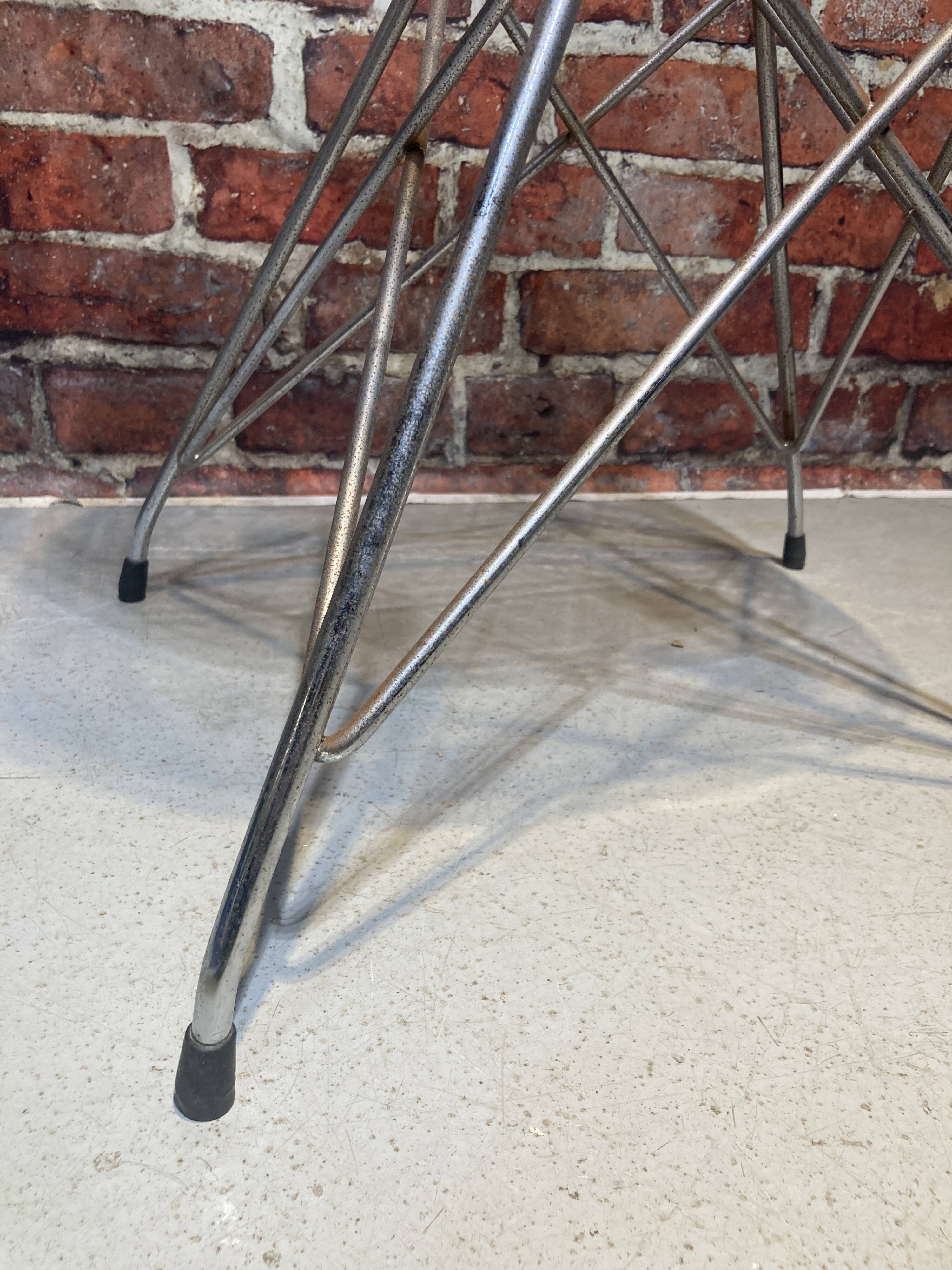 Set of four plexiglass and metal chairs