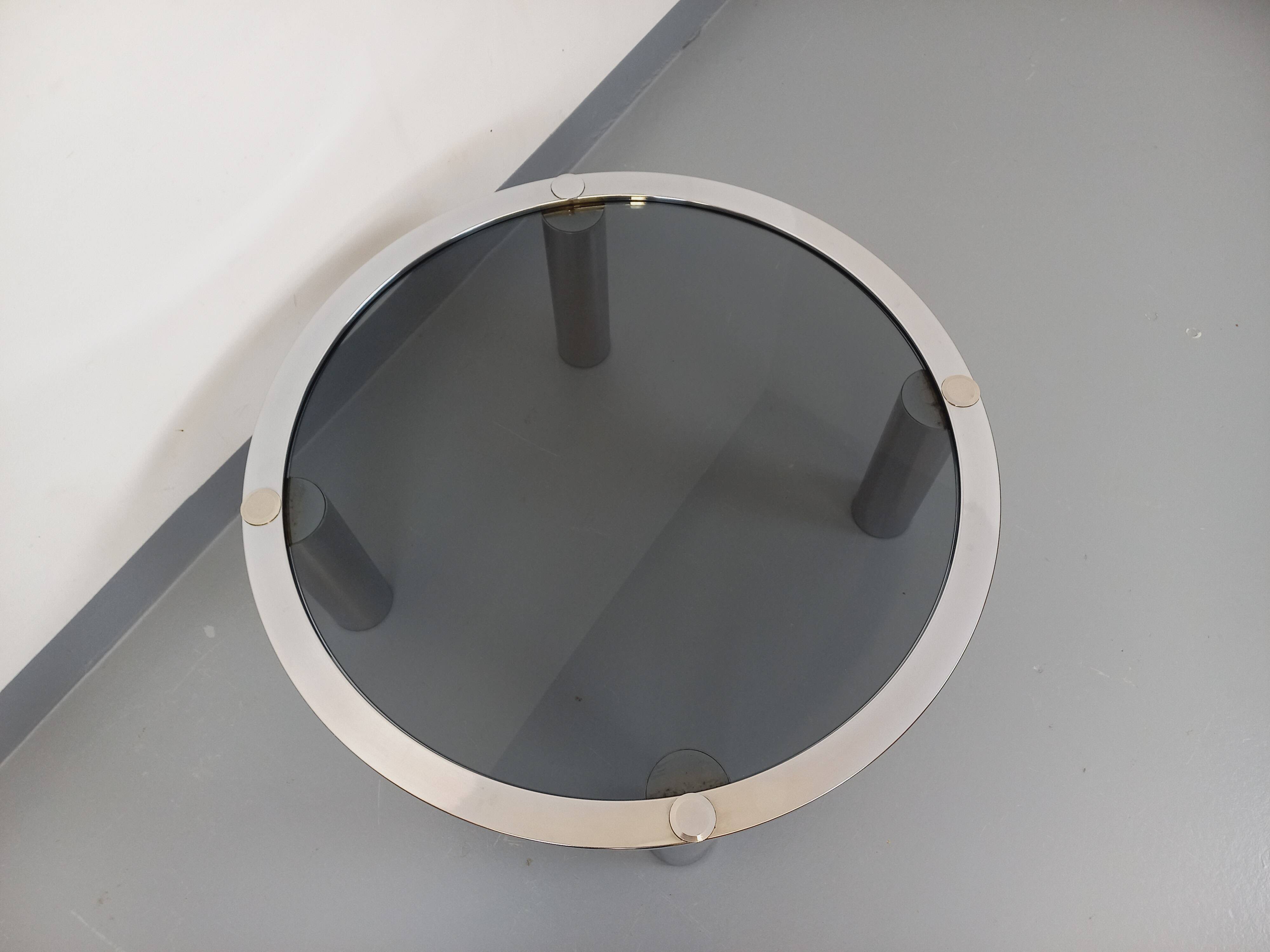 Vintage round coffee table in smoked glass and chrome metal from the 70s