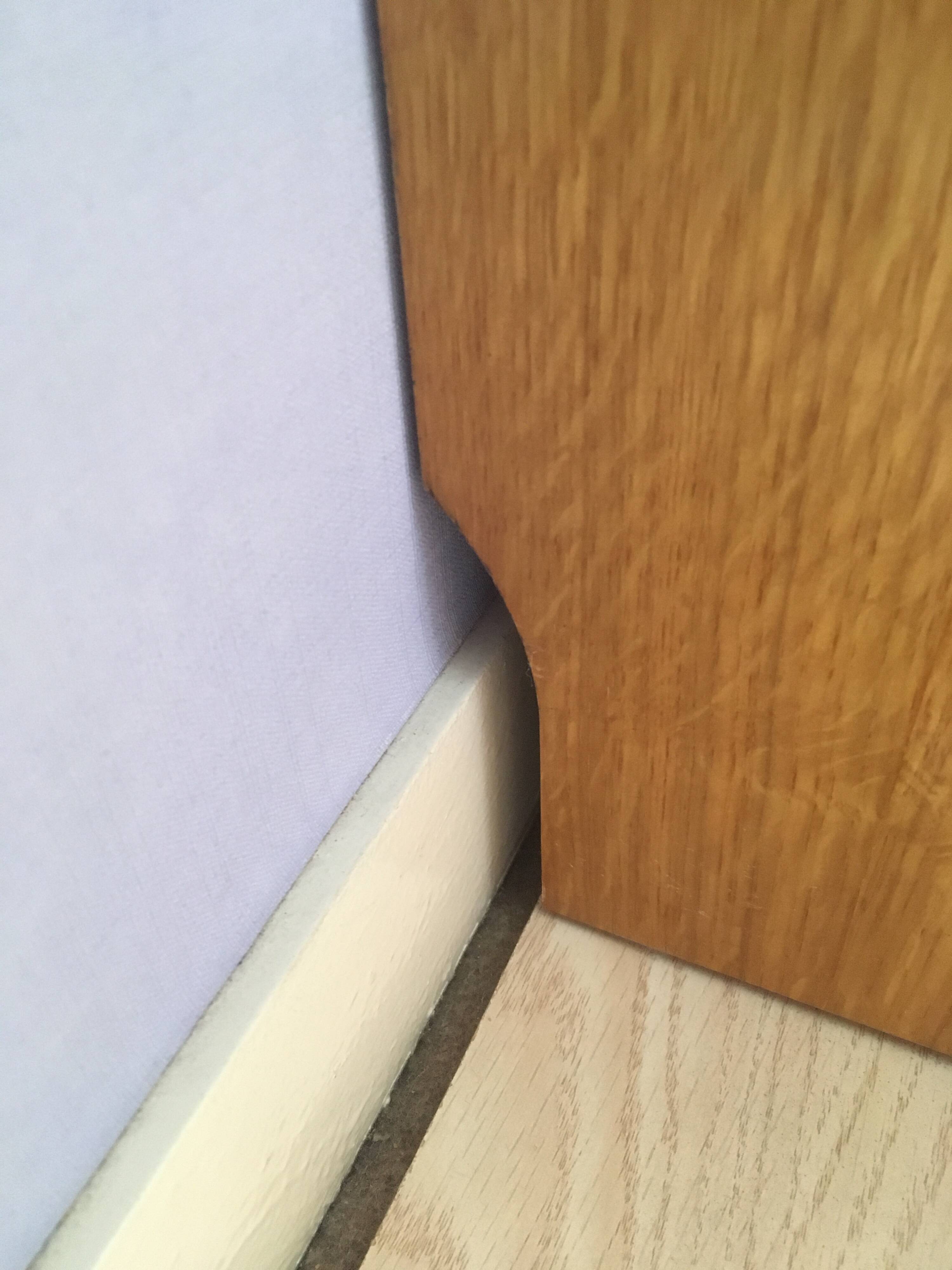 Dressing vintage Scandinavian style in light wood with wardrobe and cupboard.