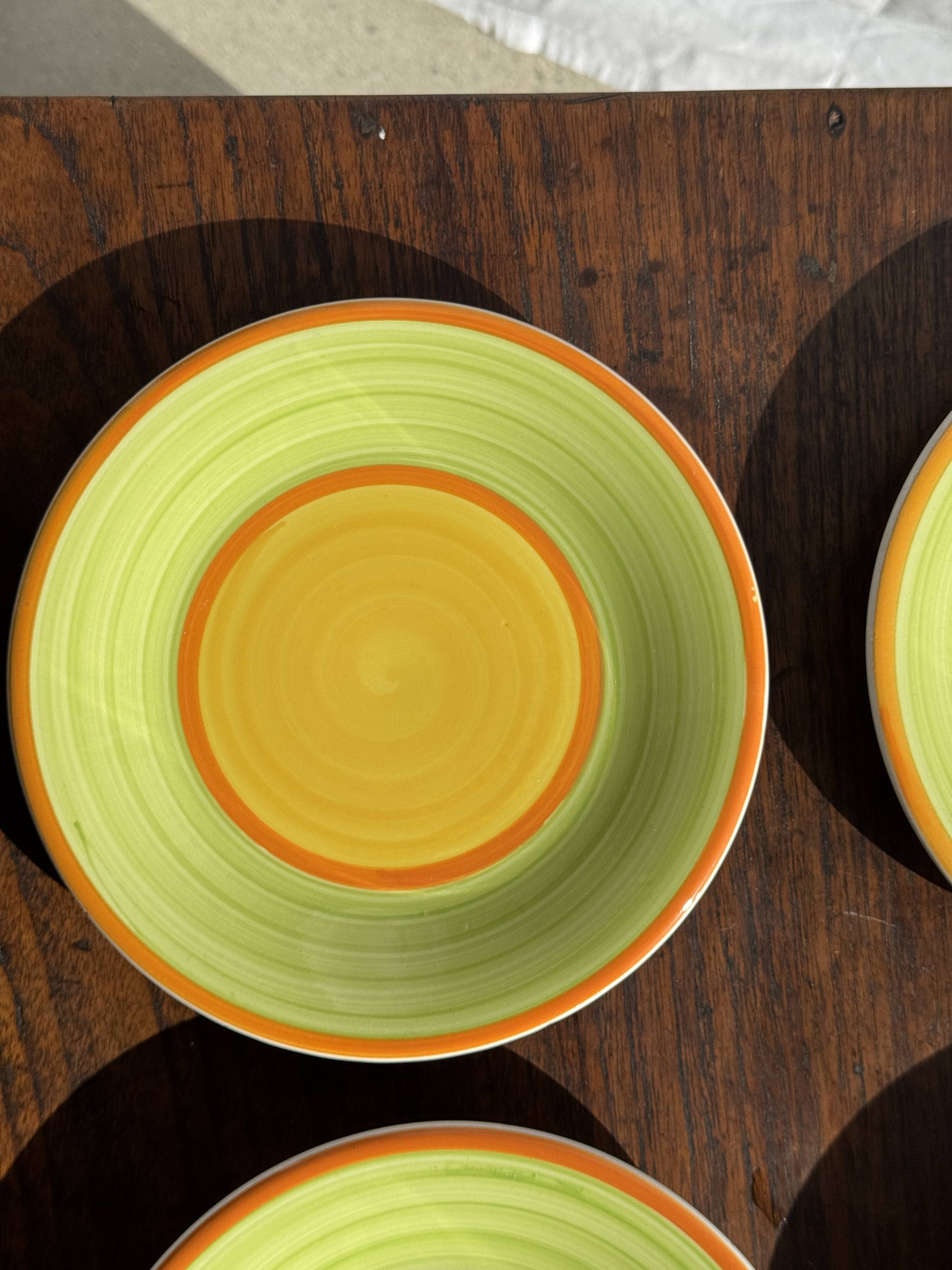 Set of 4 Italian ceramic plates in green, orange, and yellow splashes D20.