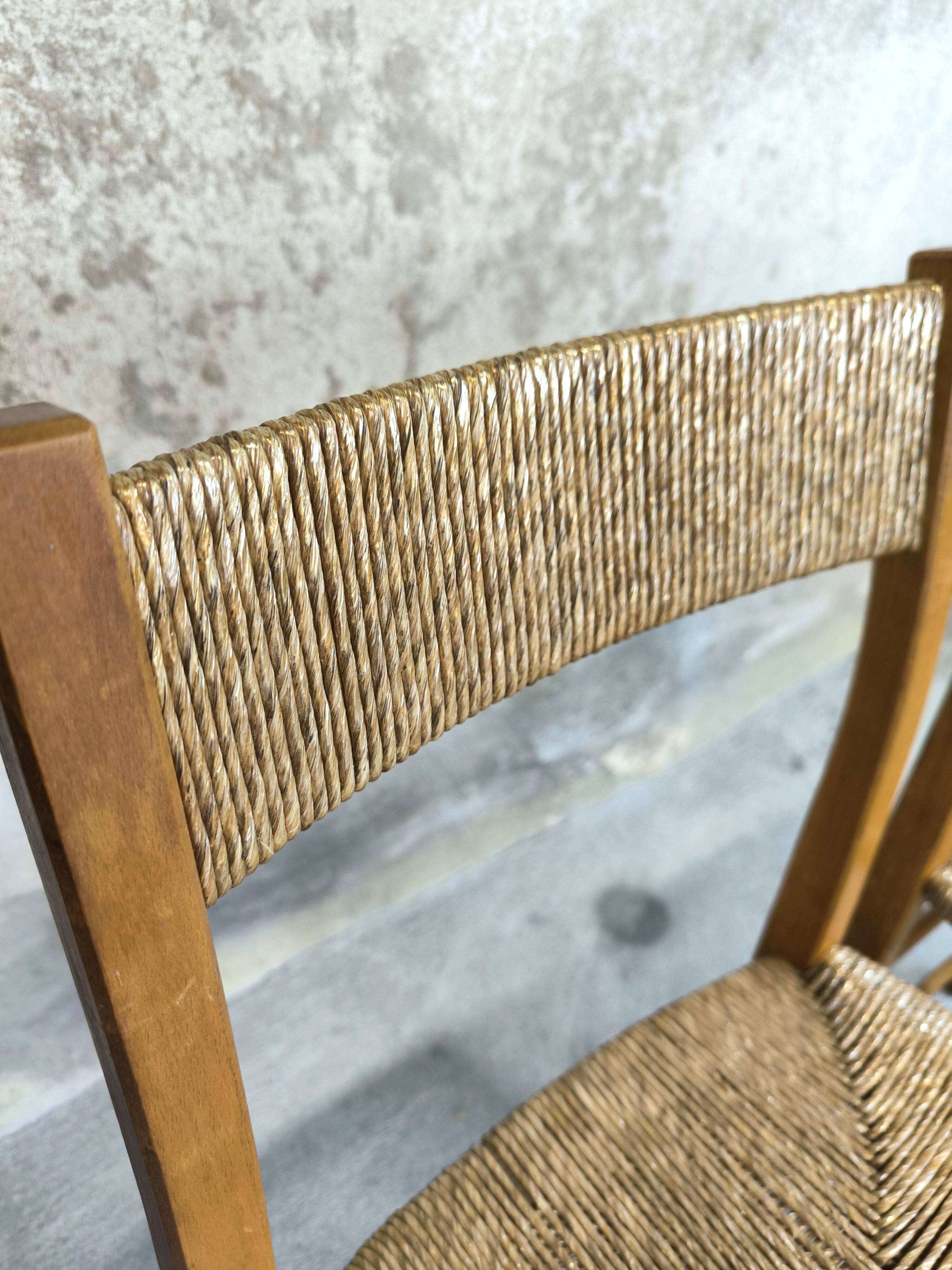 Pair of vintage wood and straw chairs