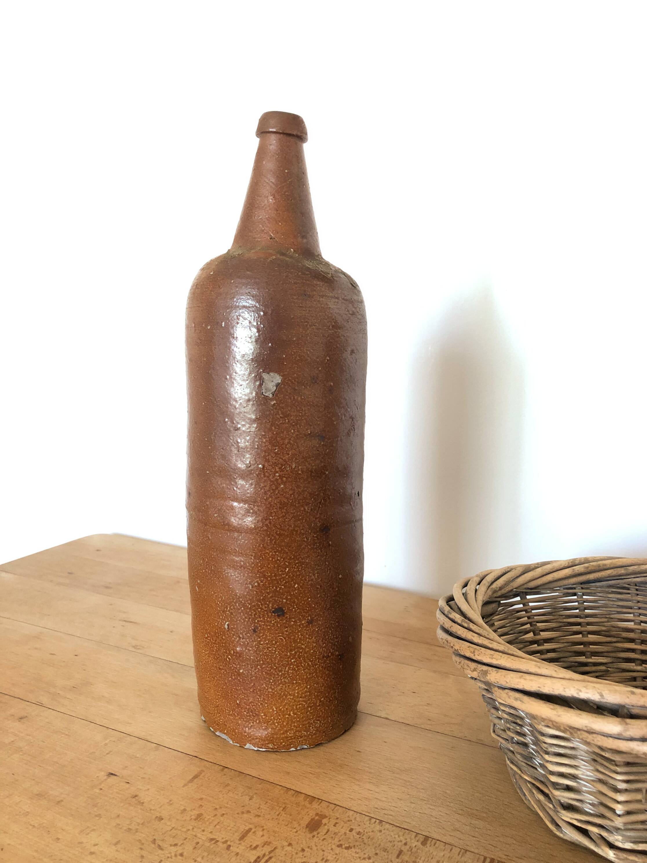 Set of 5 antique glazed stoneware bottles