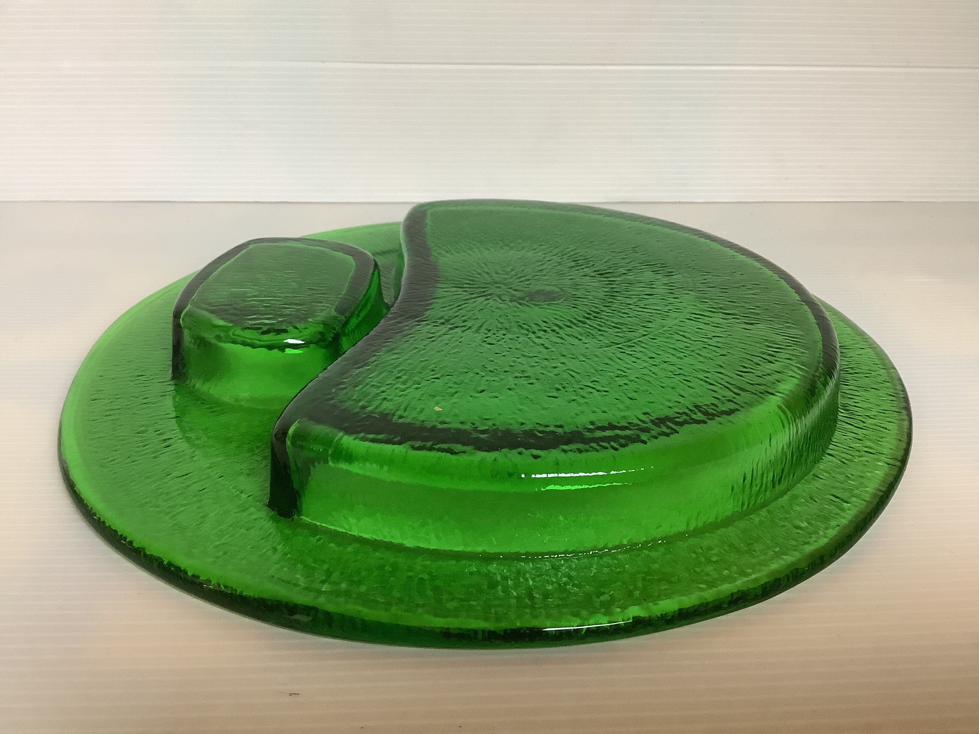 Handcrafted thick green glass empty pocket