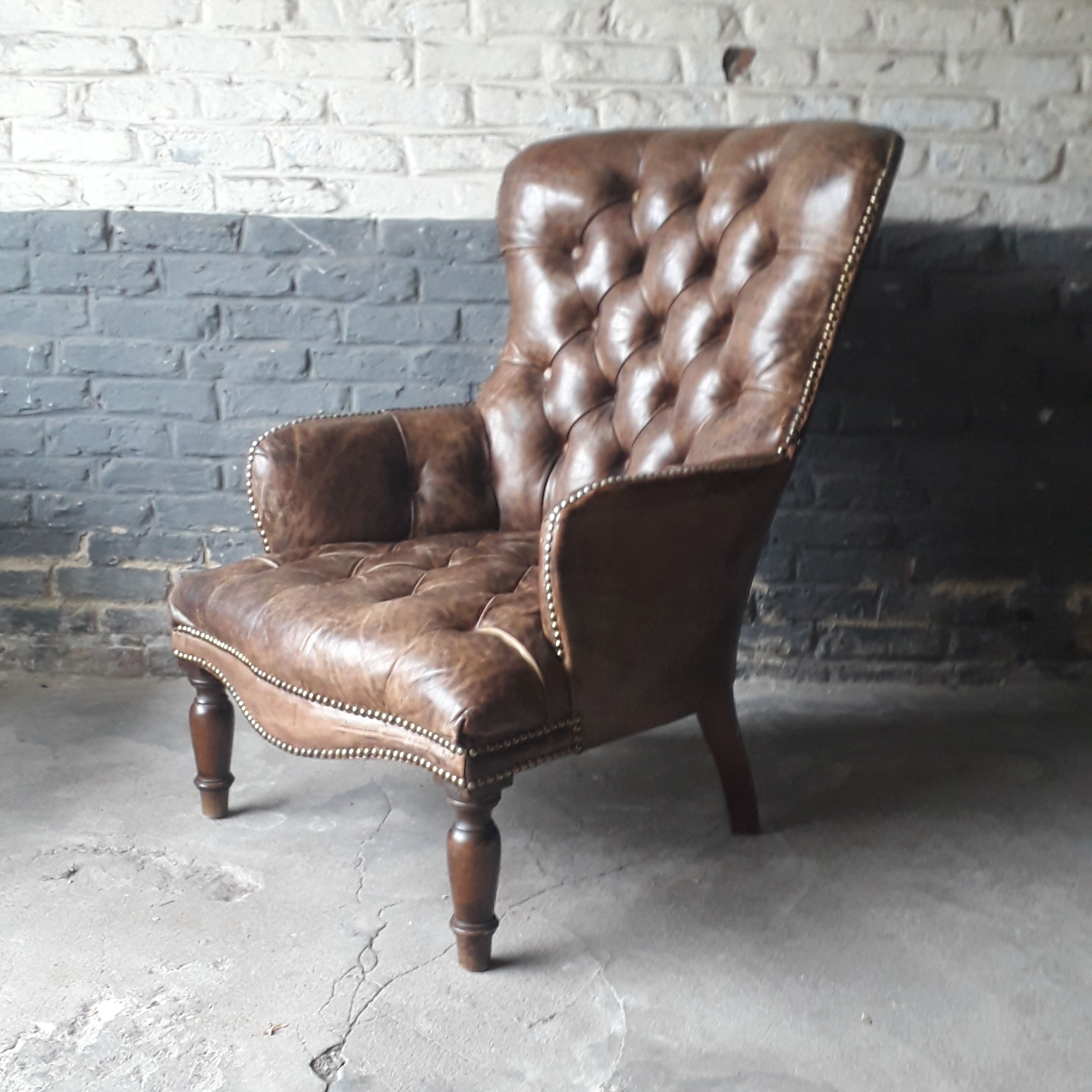 Antique Chesterfield armchair.