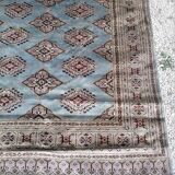 Old oriental carpet made hands. Signature. (175 x 125 )