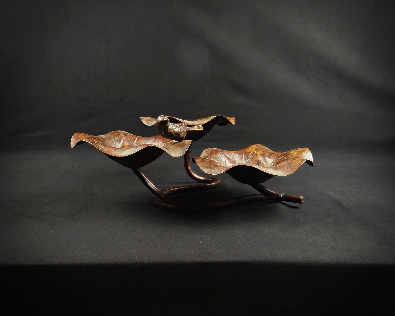 Three-tiered lotus leaf shaped patinated metal bird bath