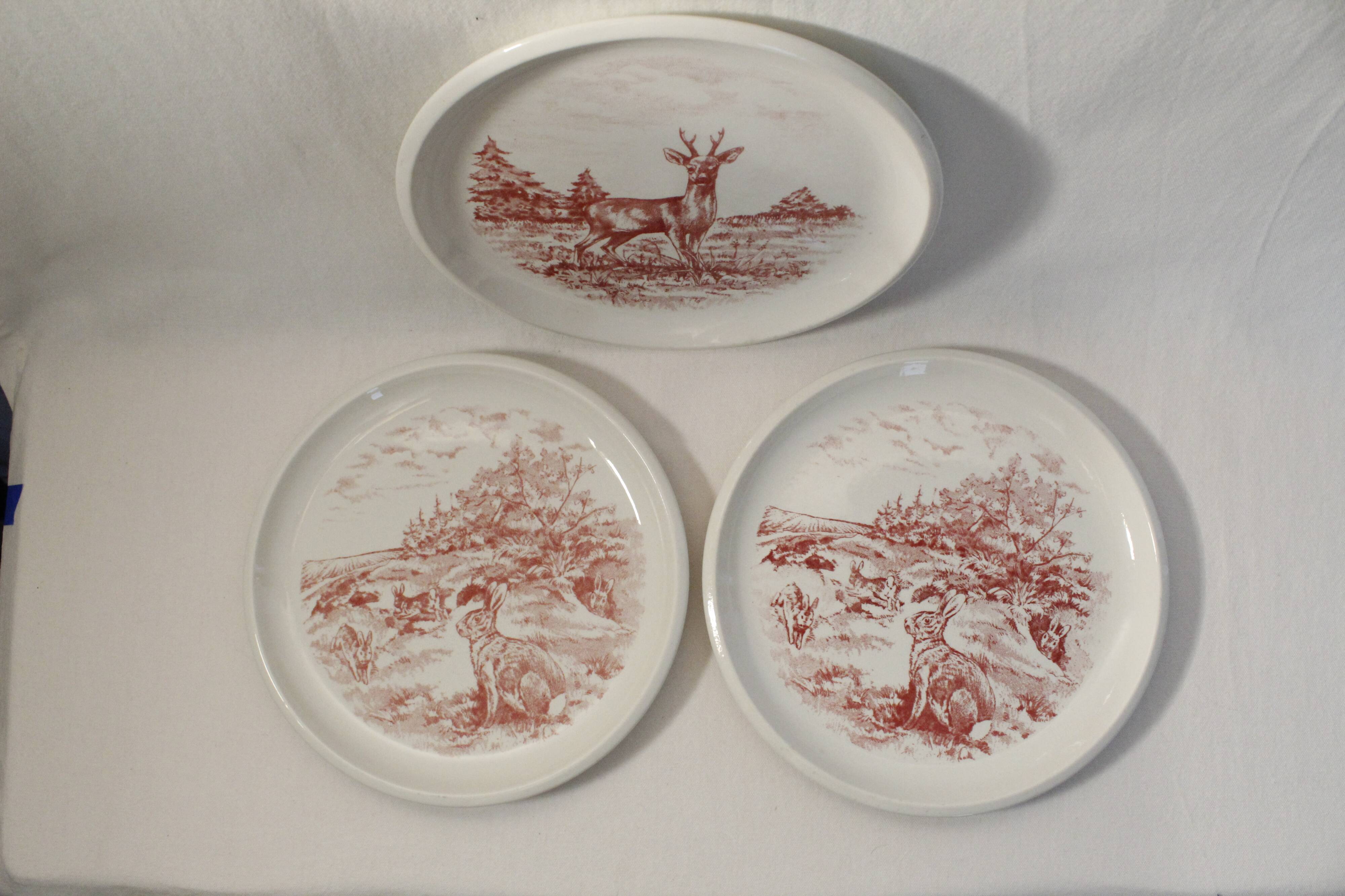 Set of 3 mismatched flat plates - red/burgundy decorations - deer and hare
