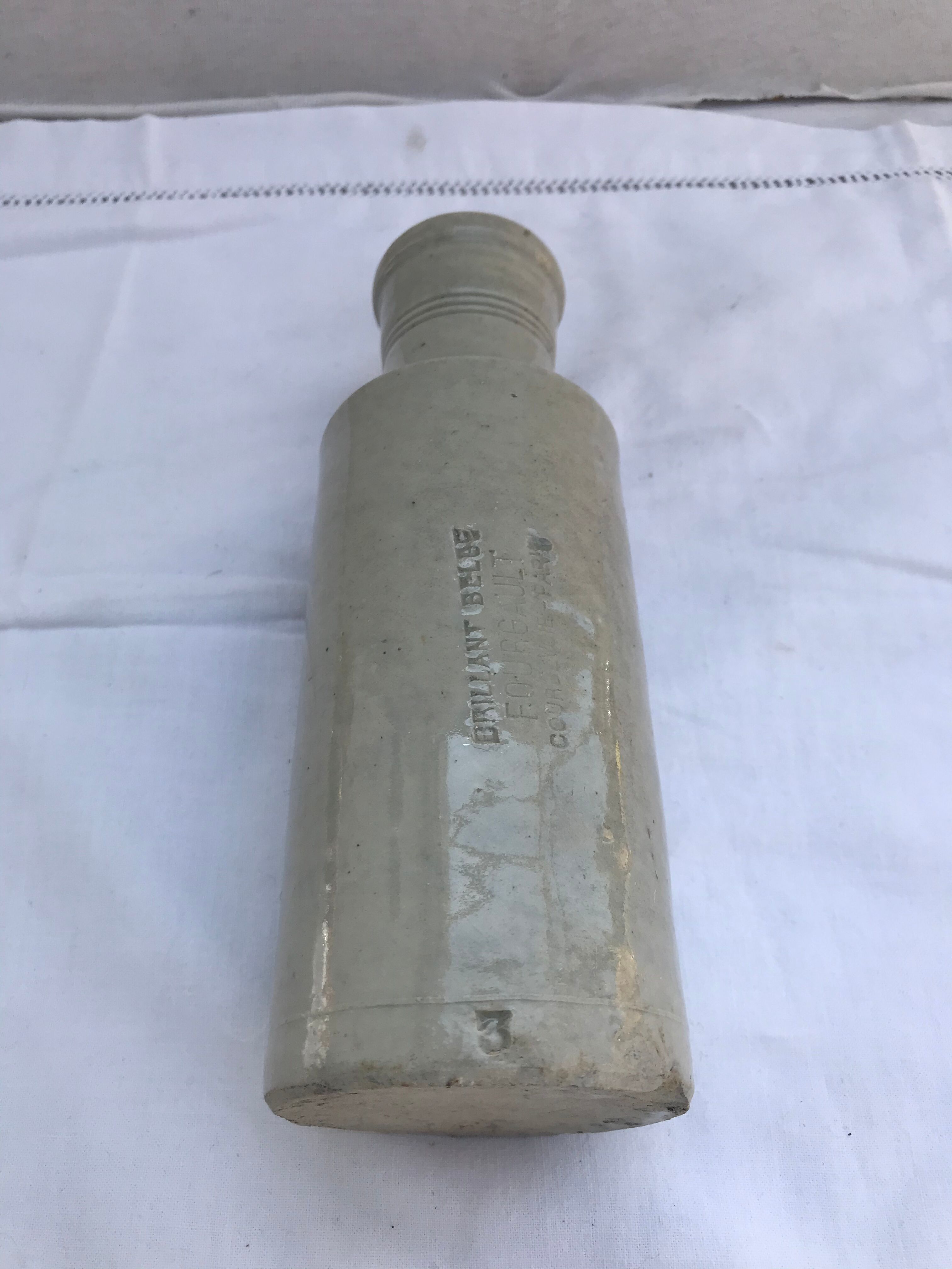 Old ceramic bottle beige Fourgault Courbevoie Paris vintage