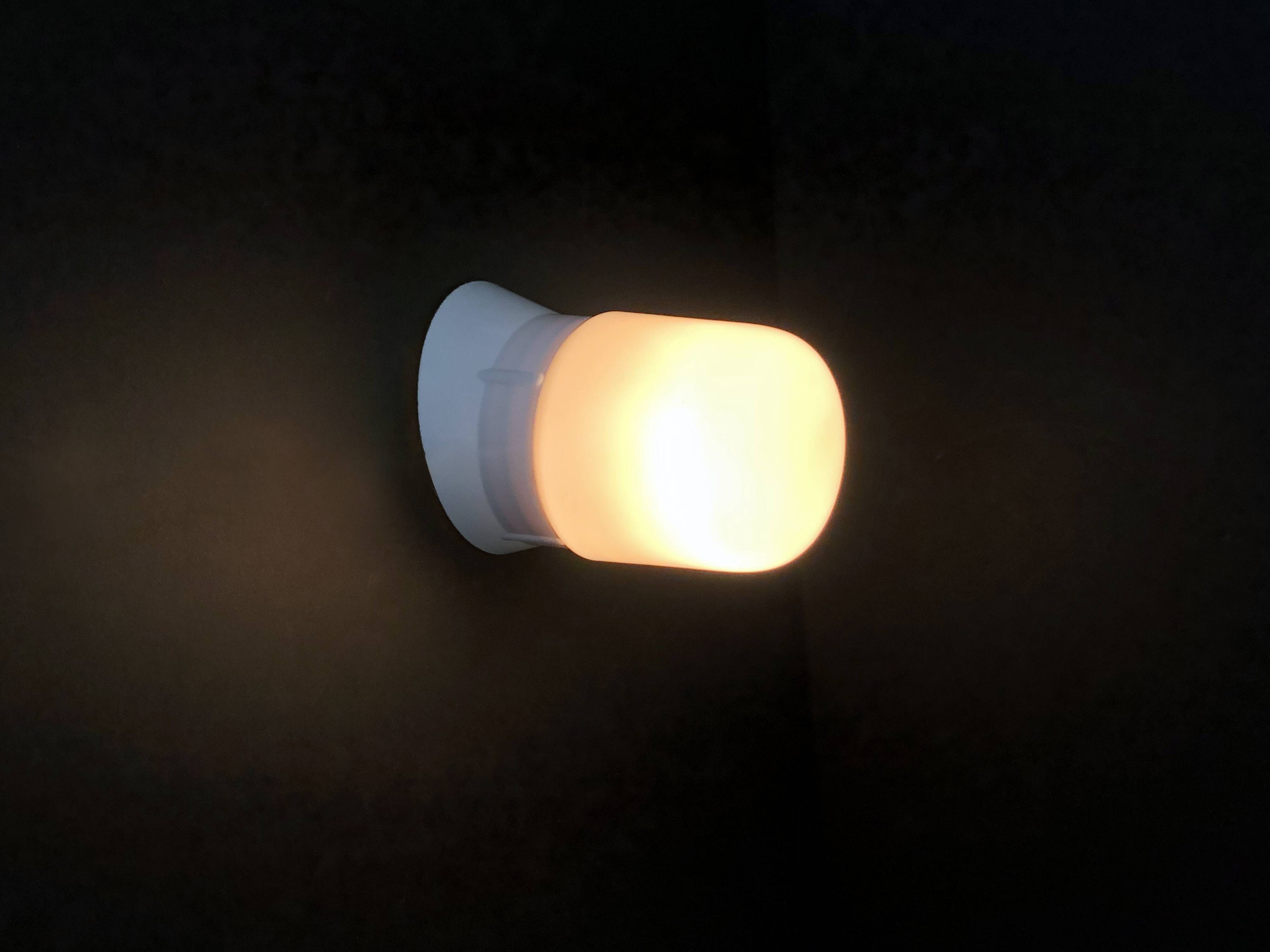 Pair of white oblique wall lights by Arno. 60s