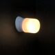 Pair of white oblique wall lights by Arno. 60s
