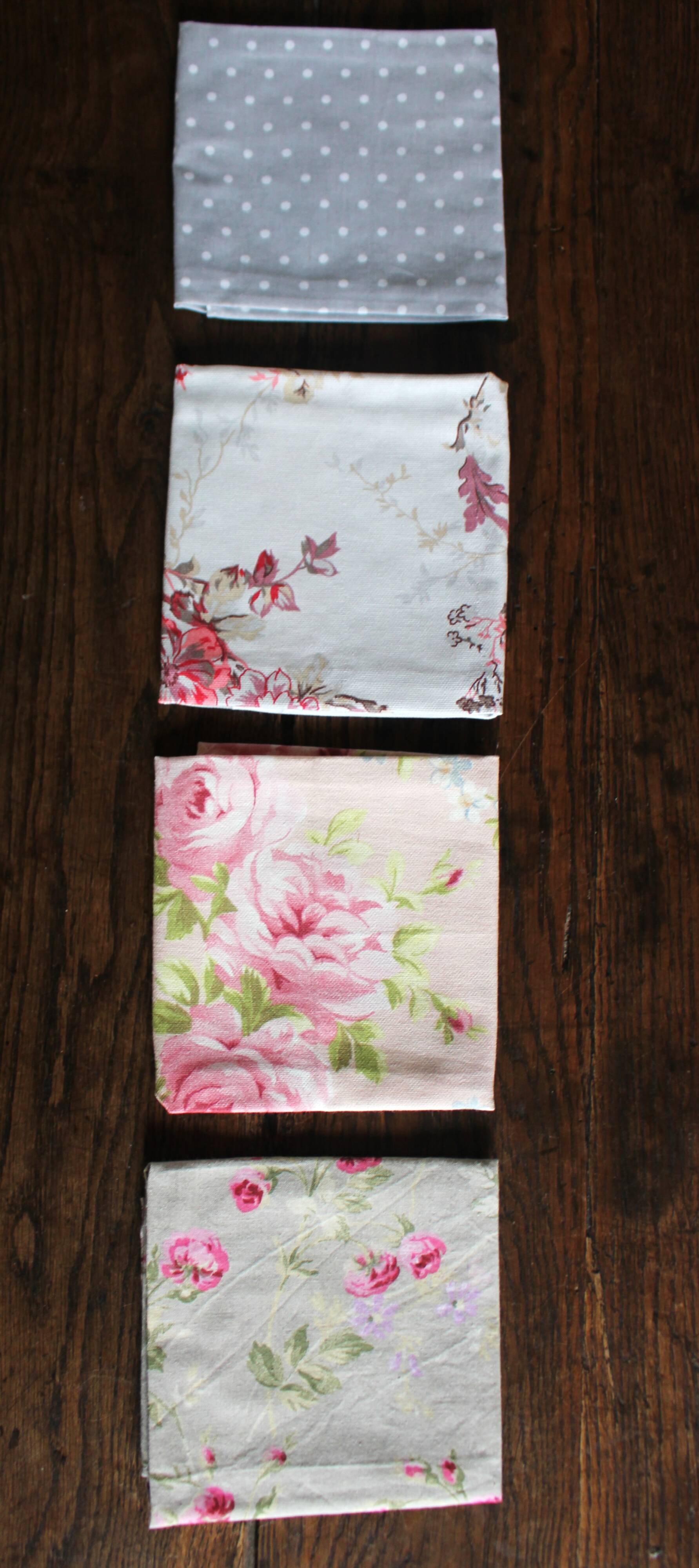 A set of 4 romantic floral polka dot napkins.