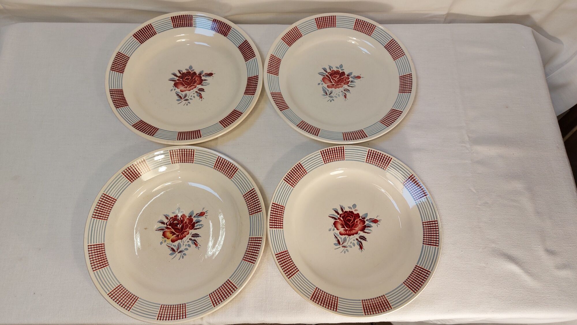Set of 4 old flat plates from the earthenware factories of St Amand