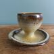 Bird-shaped egg cup in stoneware signed Jean Marie Delahaye Malicornes.