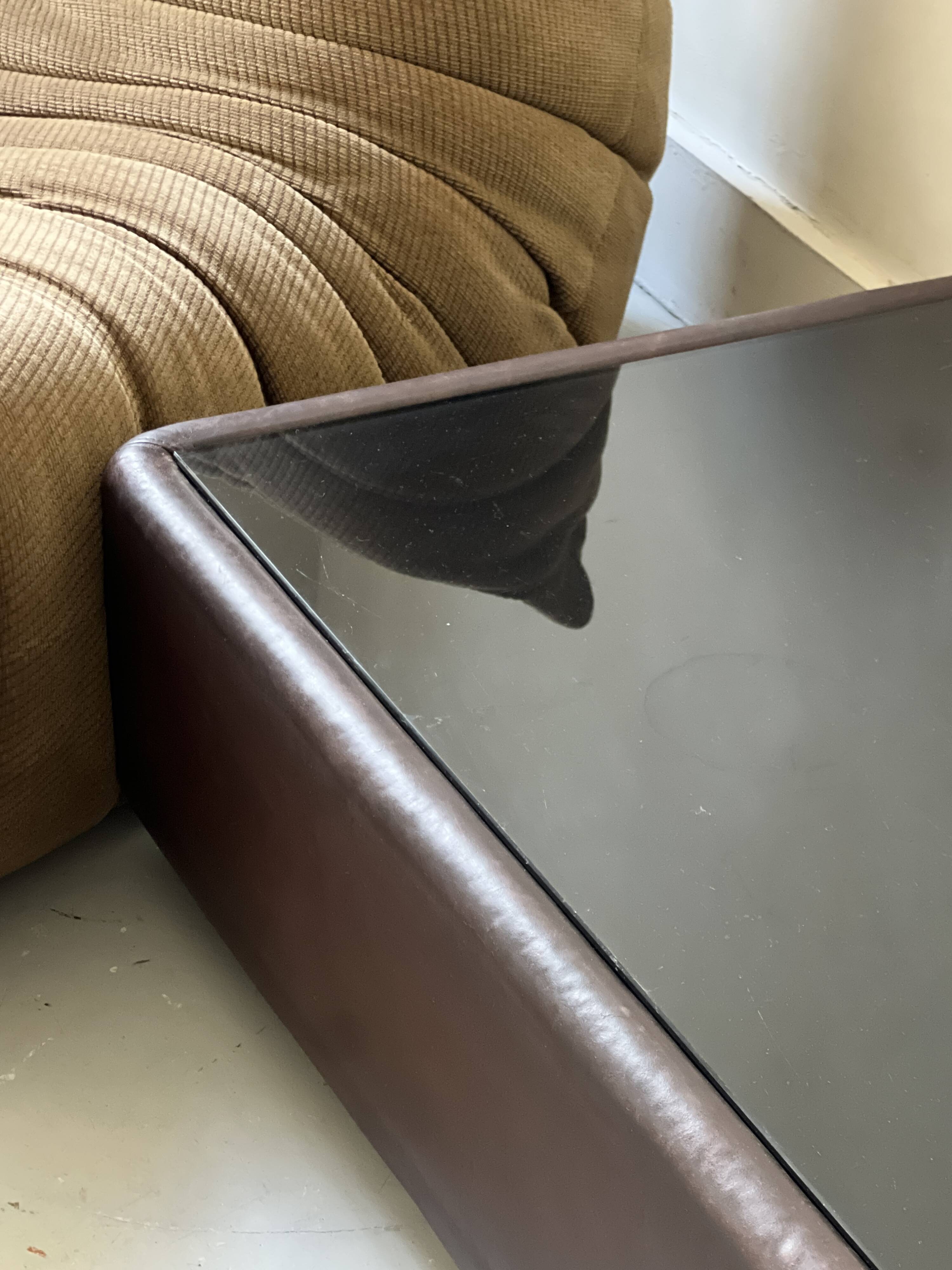 Vintage design coffee table in brown leather and black glass, Steiner France 1970.