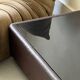 Vintage design coffee table in brown leather and black glass, Steiner France 1970.