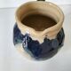 handcrafted ceramic jug with navy blue drip glaze.
