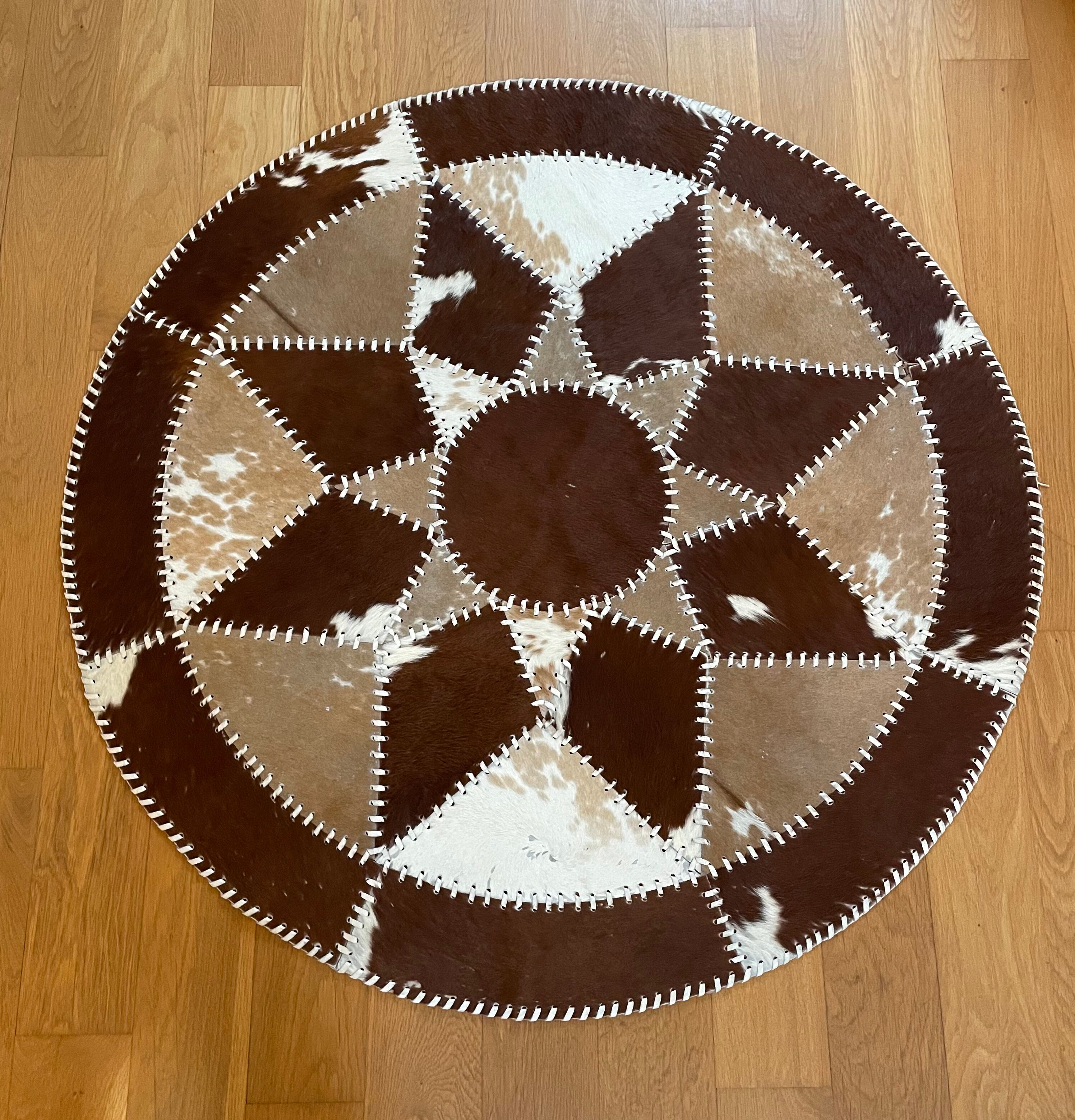 Vintage round cowhide rug 70
