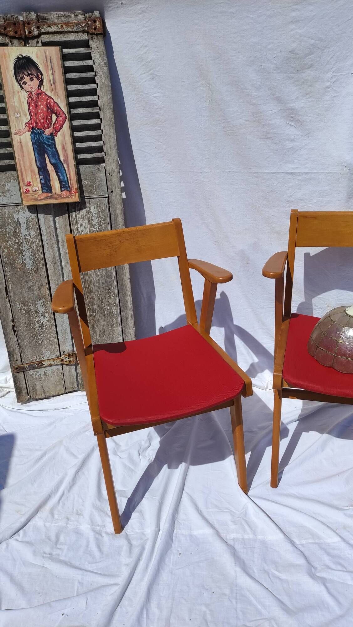 Pair of wooden armchairs and skaï foot compass of the 50s