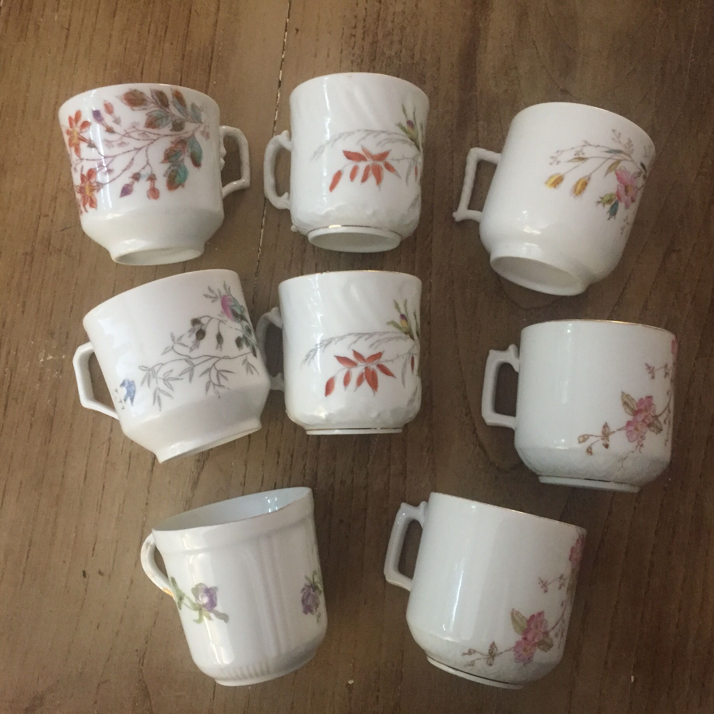 8 mismatched antique porcelain cups
