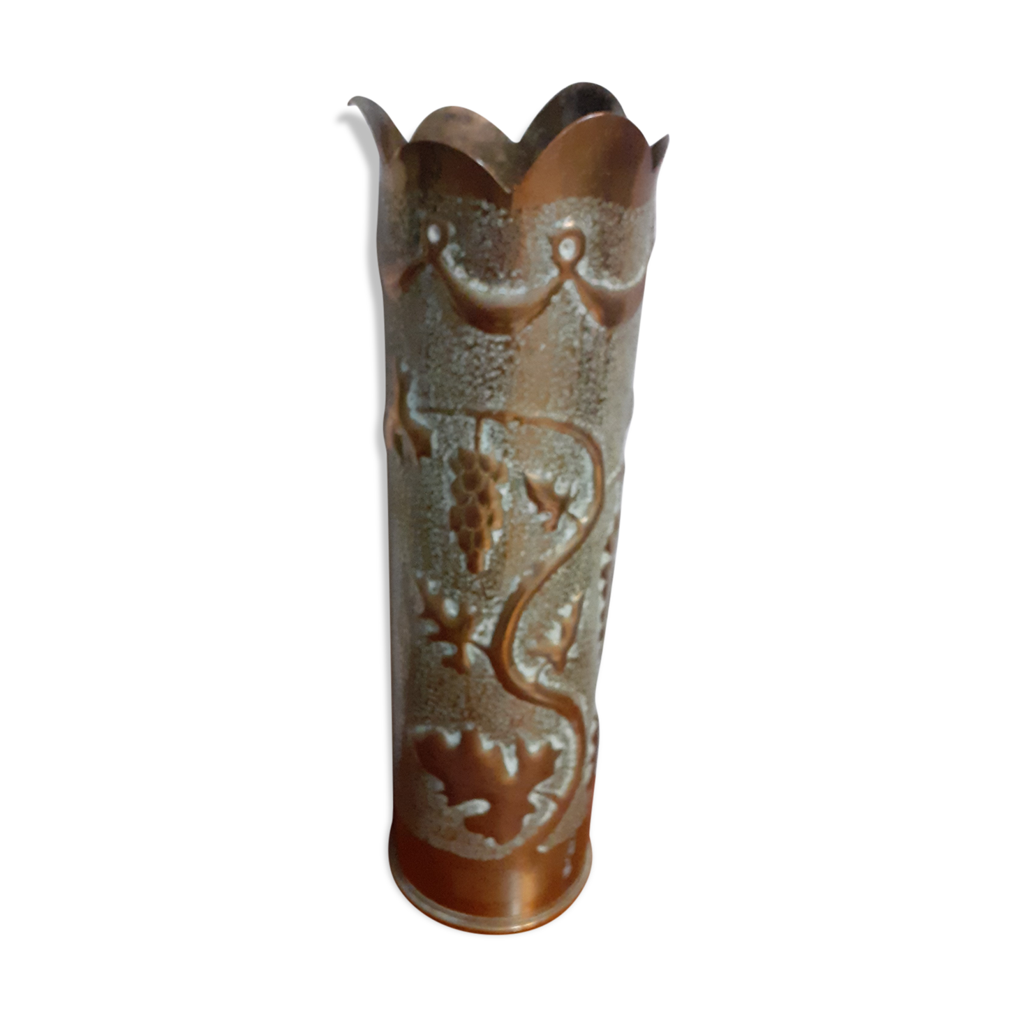 Shell casing vase carved into the trenches