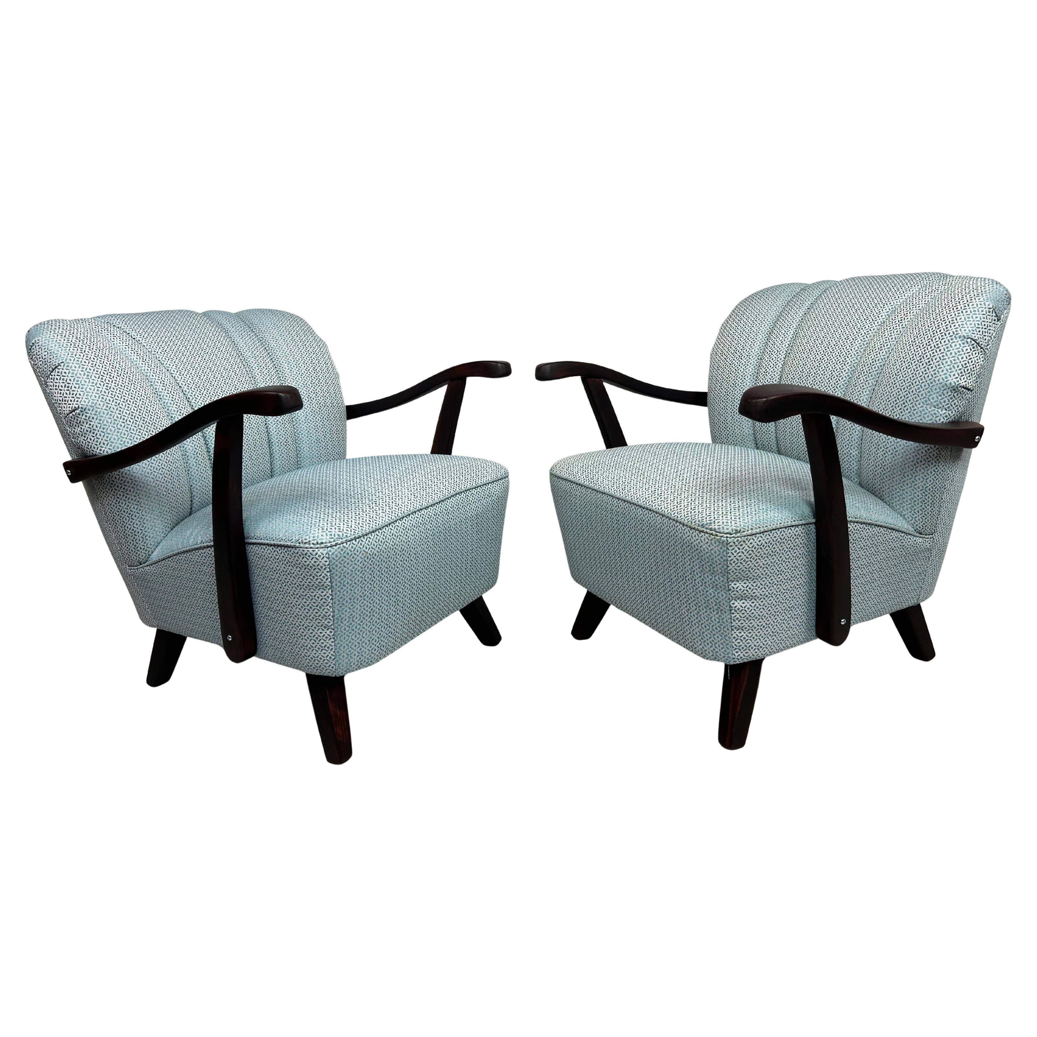Art Deco blue club chairs