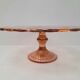 Pink pressed glass cake stand