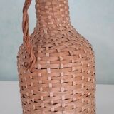 Bottle in his suit of wicker