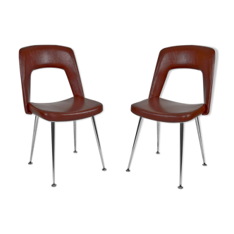 Pair of chairs in chrome and skaï, circa 1960