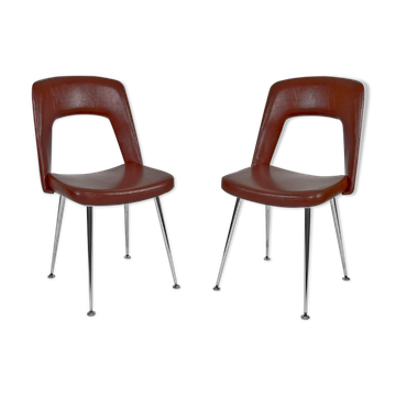 Pair of chairs in chrome and skaï, circa 1960