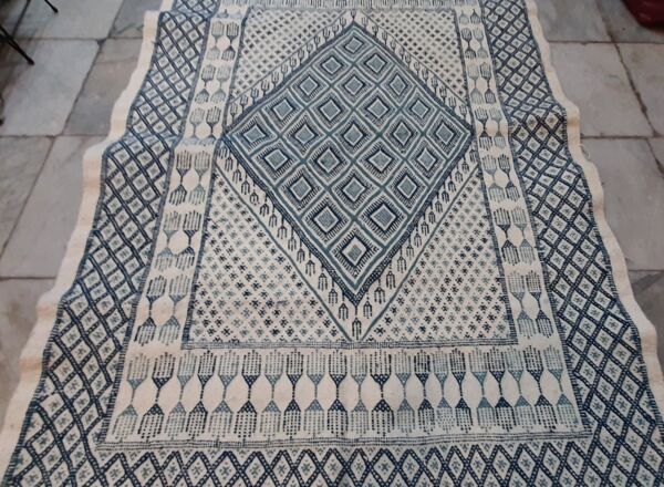 Tapis pure d'occasion