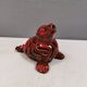 Beautiful seal in ceramic with metallic red glaze.