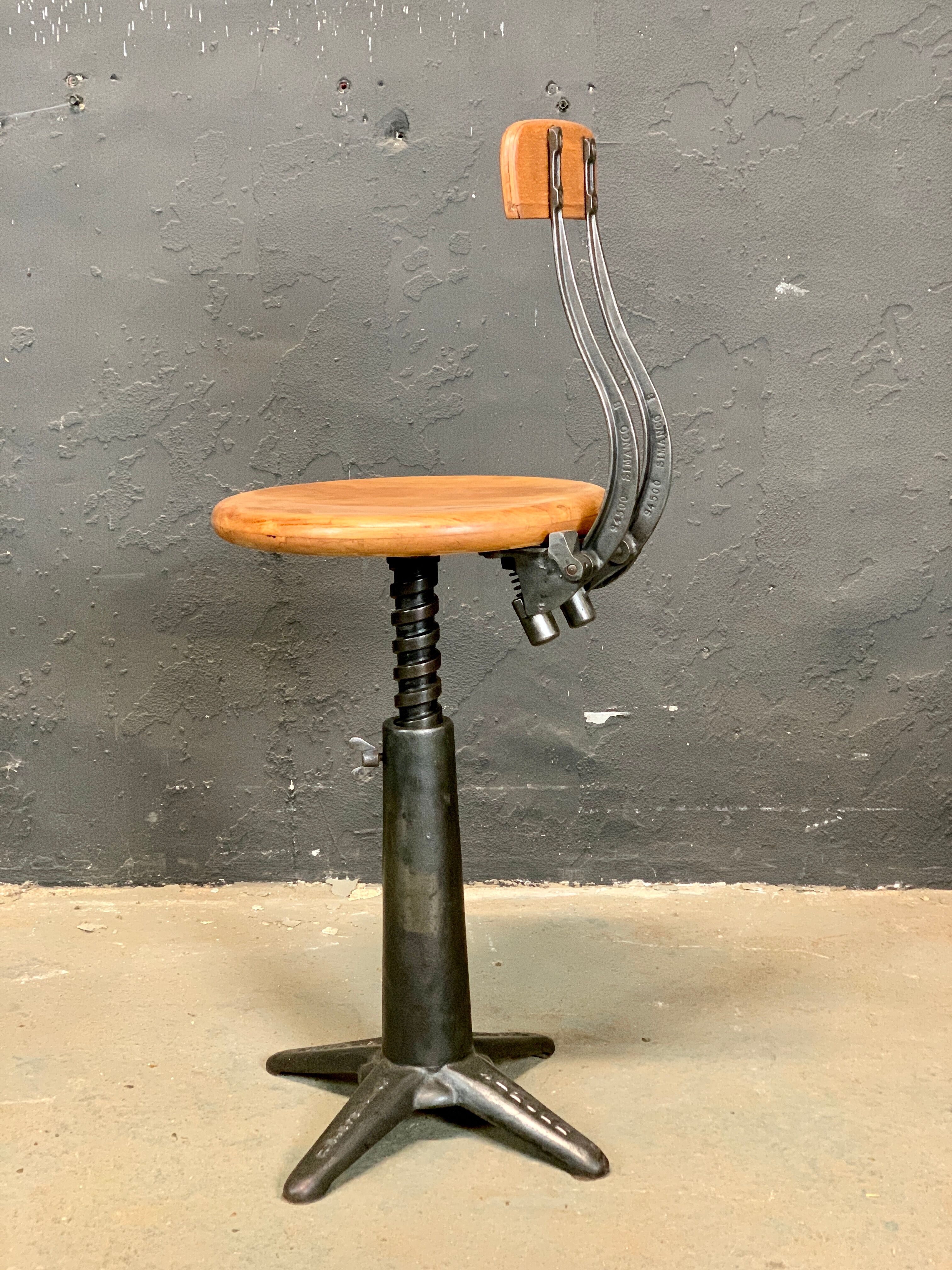 Singer industrial stool with back 1920