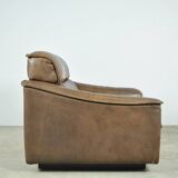Buffalo leather vintage brutalist armchair by hugo de ruiter, leolux, 1970s