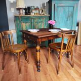 Antique farmhouse table and bistro chairs