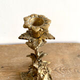 Candlestick in gilt bronze decorated with leaves