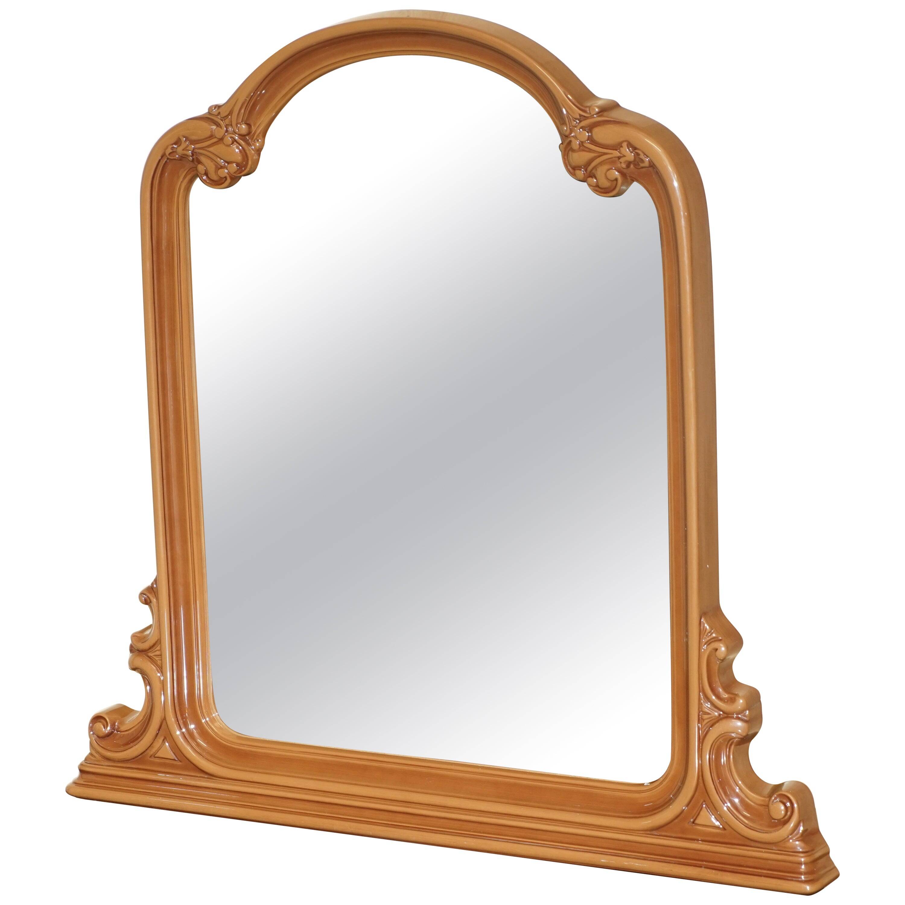 Vintage Art Deco decorative mirror with a thick frame.