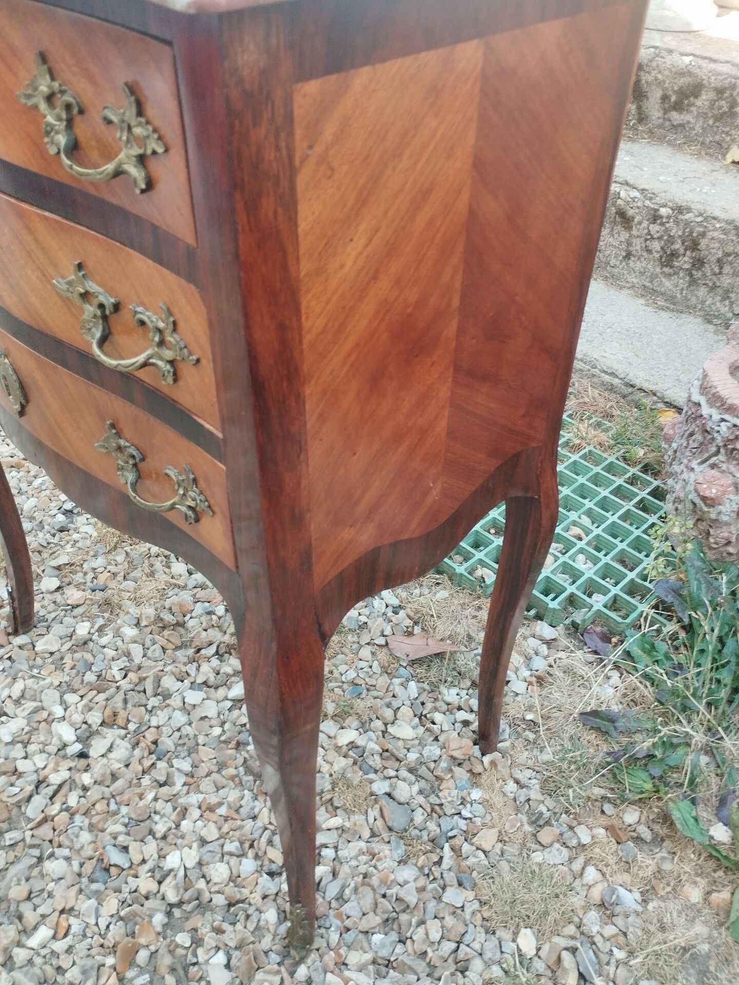 Antique marquetry commode with marble top in Louis XVI style.