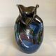 Iridescent modernist vase by Thomas Buxo