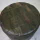 Pouf in black/green leather