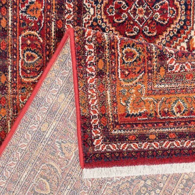 Antique red oriental-style wool rug