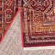Antique red oriental-style wool rug