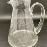 Glass and carafe set with chiseled flower motif