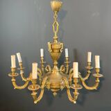 Important Louis XVI style chiseled bronze chandelier with 8 light arms by Lucien Gau