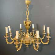 Important bronze chiseled chandelier in Louis XVI style with 8 light arms by Lucien Gau.