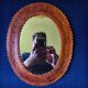 Leather repoussé mirror, Sri Lanka, 1960s