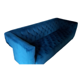 Royal blue velvet upholstered sofa