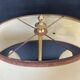 Directoire style bouillotte lamp in brass with double lights.