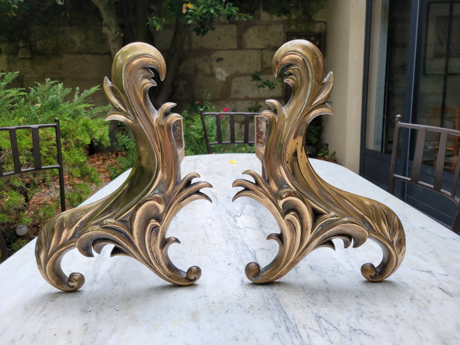 Gilded bronze chenets from the 19th century