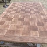 Louis XV style walnut table with a natural wood top.